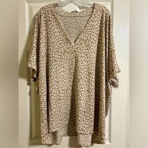 Leopard print oversized shirt.